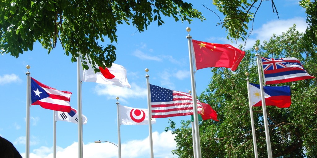Ring of flags representing some of the plantation ethnic groups in the Territory of Hawai'i